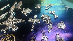 Choose any 2 charms to make your feather personal and one of a kind